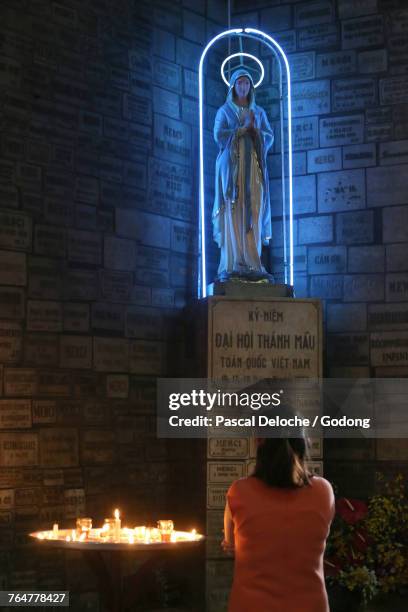 Ho Chi Minh City Notredame Cathedral Basilica Of Saigon Woman Praying Virgin Mary Ho Chi Minh City Vietnam High-Res Stock Photo