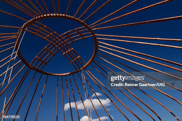 red wood frame roof shanyrak of yurt against a blue sky at saty kazakhstan - yurt stock pictures, royalty-free photos & images