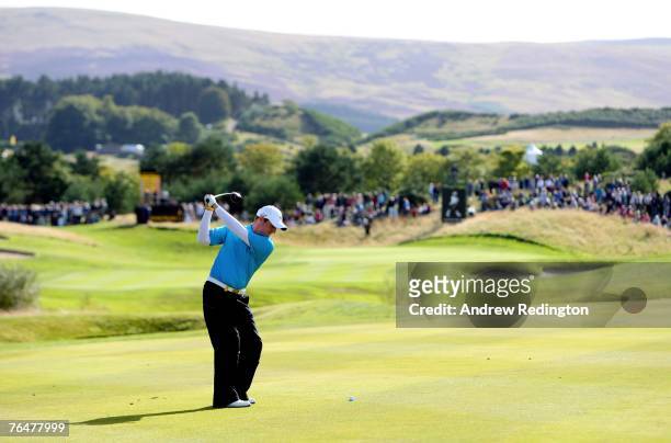 Marc Warren of Scotland hits his second shot on the 16th hole during the final round of the Johnnie Walker Championship on the PGA Centenary Course...