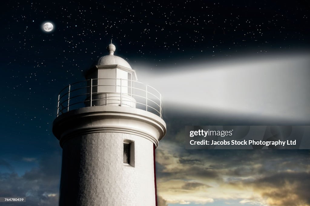 Beam of light from lighthouse at night