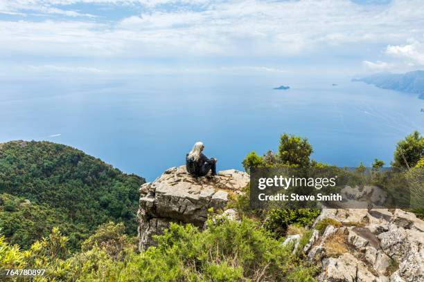 caucasian woman admiring scenic view of ocean - amalfi hike stock pictures, royalty-free photos & images