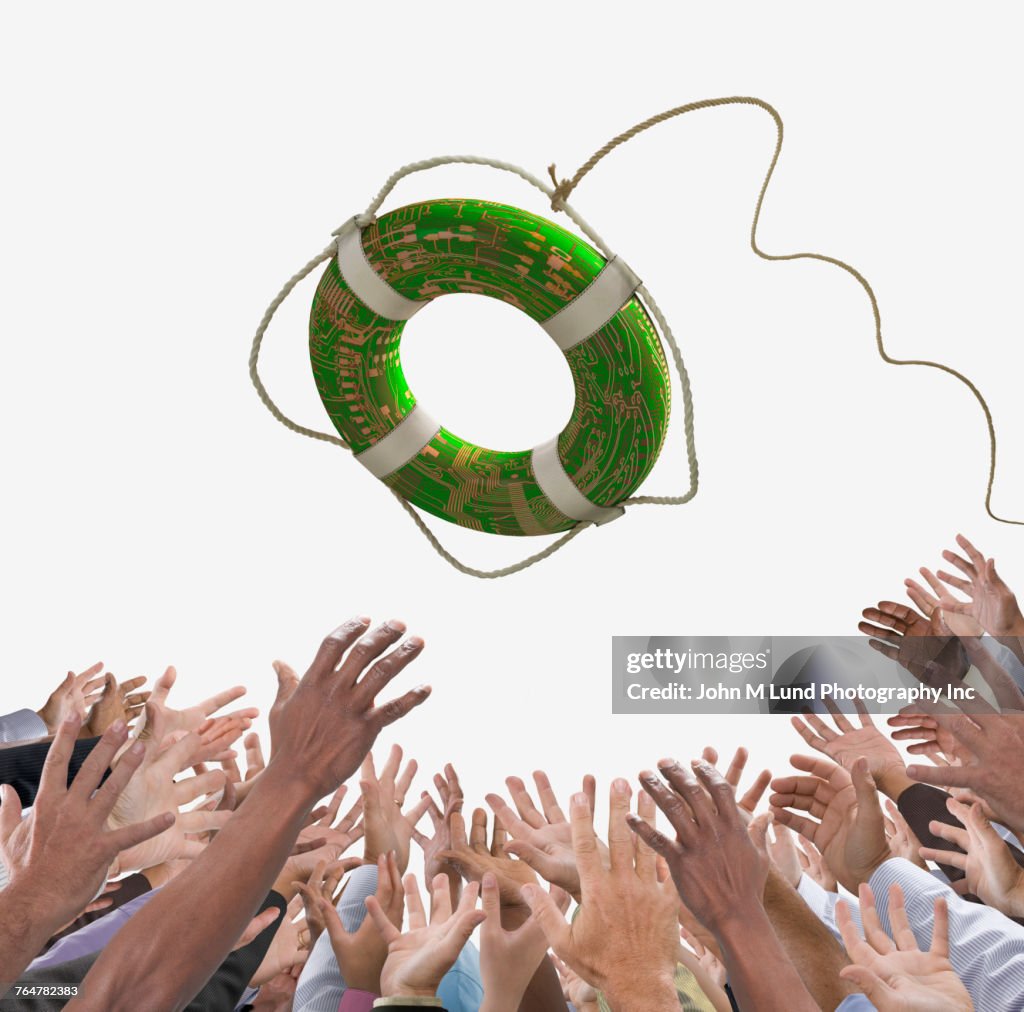 Hands of crowd reaching to technology life ring in sky