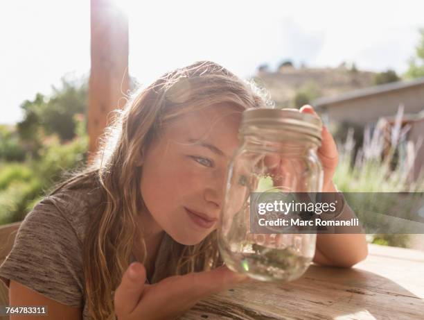 caucasian girl looking at jar - lamy new mexico stock pictures, royalty-free photos & images