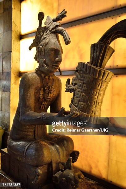 statue of a mayan priest offering gifts - nuevo vallarta stock pictures, royalty-free photos & images