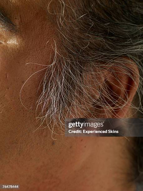 close-up of mature man's ear - nape of neck stock pictures, royalty-free photos & images