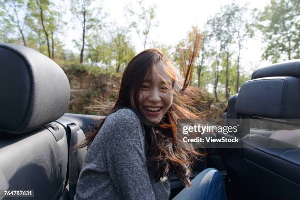 young woman outing - messy car interior stock pictures, royalty-free photos & images