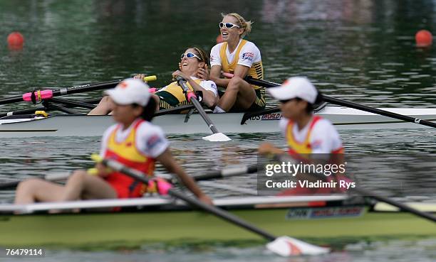 Amber Halliday and Marguerite Houston of Australia celebrate after winning the women's lightweight double sculls final during the FISA Rowing World...