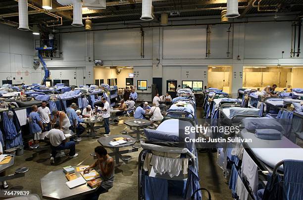 Inmates at the Mule Creek State Prison interact in a gymnasium that was modified to house prisoners August 28, 2007 in Ione, California. A panel of...