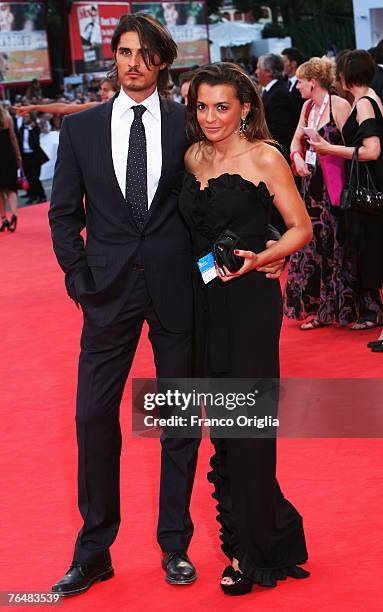 Journalist Antonia De Mita and unidentified guest attend the opening ceremony and the Atonement Premiere on day 1 of the 64th Annual Venice Film...