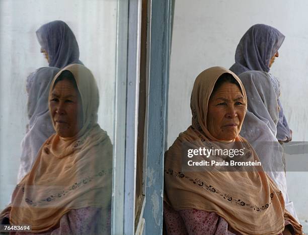 Former drug addicts pray during their month long detox program at the Sanga Amaj Drug Treatment Center August 28, 2007 in Kabul, Afghanistan. The...