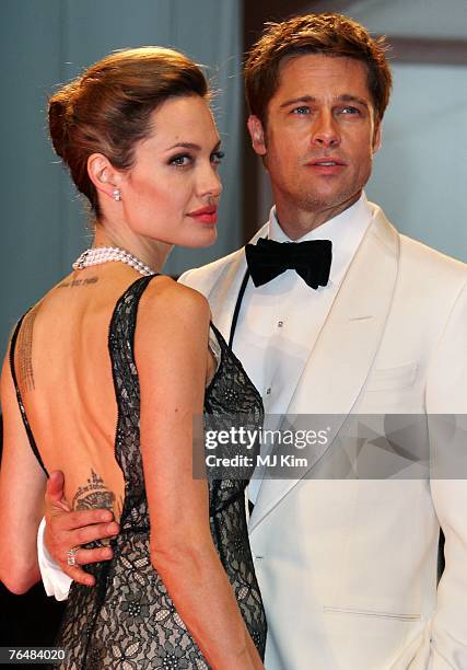 Angelina Jolie and Brad Pitt attend the The Assassination of Jesse James by the Coward Robert Ford premiere on the Day 5 of the 64th Annual Venice...