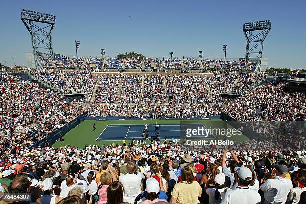 David Ferrer of Spain celebrates after defeating David Nalbandian of Argentina during day seven of the 2007 U.S. Open at the Billie Jean King...