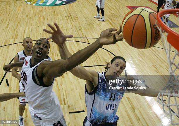 Dwight Howard of the USA battles Martin Dario Leiva of Argentina for a rebound during the FIBA Americas Championship 2007 Gold Medal game at Thomas &...
