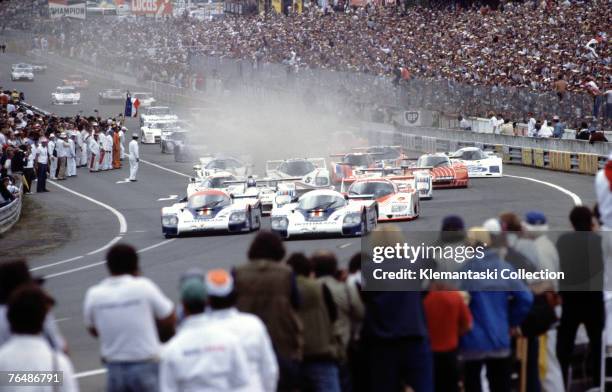 Jacky Ickx and Derek Bell, in the no. 1 Start! Porsche 956, leading the 24 Hours of Le Mans race, Le Mans, June 1982 The no. 2 Porsche is driven by...