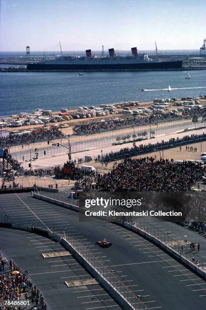 The Ferrari 312T of Clay Regazzoni, and the liner 'Queen Mary' in the background, during the United States West Grand Prix at Long Beach, 28th March...