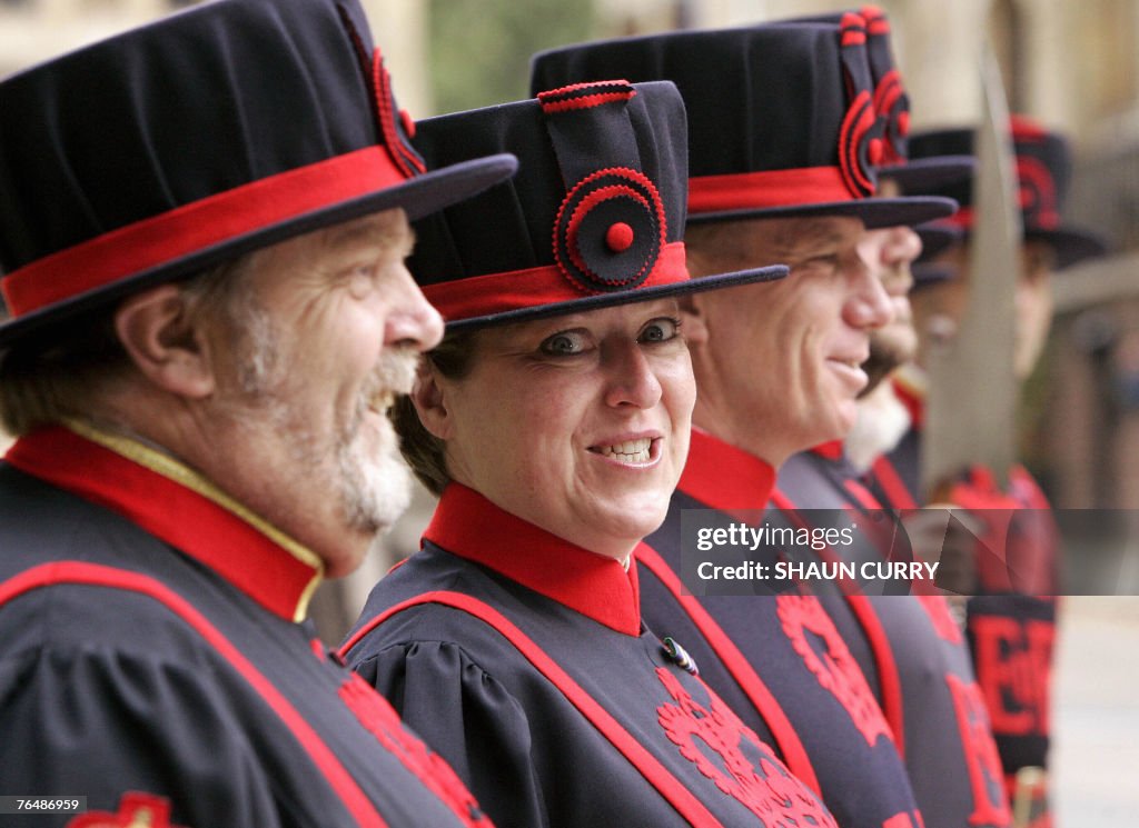 Yeoman Warder Moira Cameron (2nd L) star