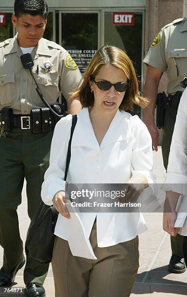 Actor Robert Blake's daughter, Delinah Blake, exits the Van Nuys Superior courthouse after a hearing in the case of Blake on June 18 2002 in Van...