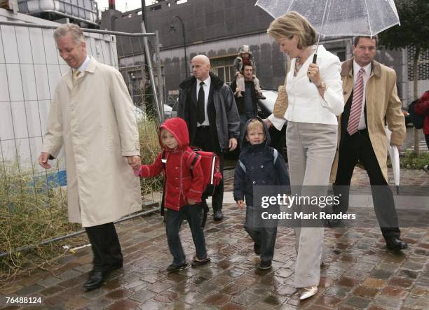 Prince Philippe, Princess Elisabeth ,Prince Gabriel and Princess Mathilde of Belgium arrive at Sint Jan Berghmans College to attend the first day of...