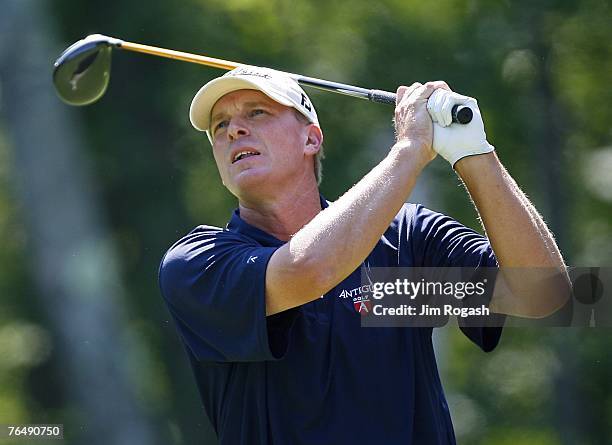 Steve Stricker watches the flight of his shot from the second tee box during the fourth and final round of Deutsche Bank Championship, the second...