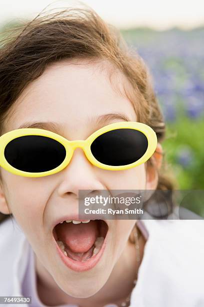 girl wearing sunglasses - face surprise heat stock pictures, royalty-free photos & images