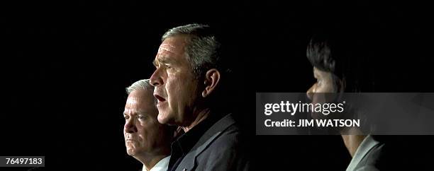 President George W. Bush makes a statement to the press with US Secretary of Defense Robert Gates and US Secretary of State Condoleezza Rice after...