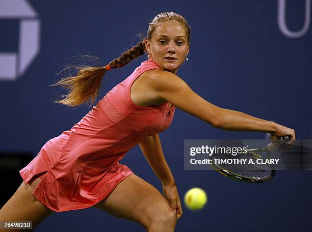 Sixth seed Anna Chakvetdze of Russia hits a return to Austria's Tamira Paszek during their fourth round match at the US Open Tennis Championships at...