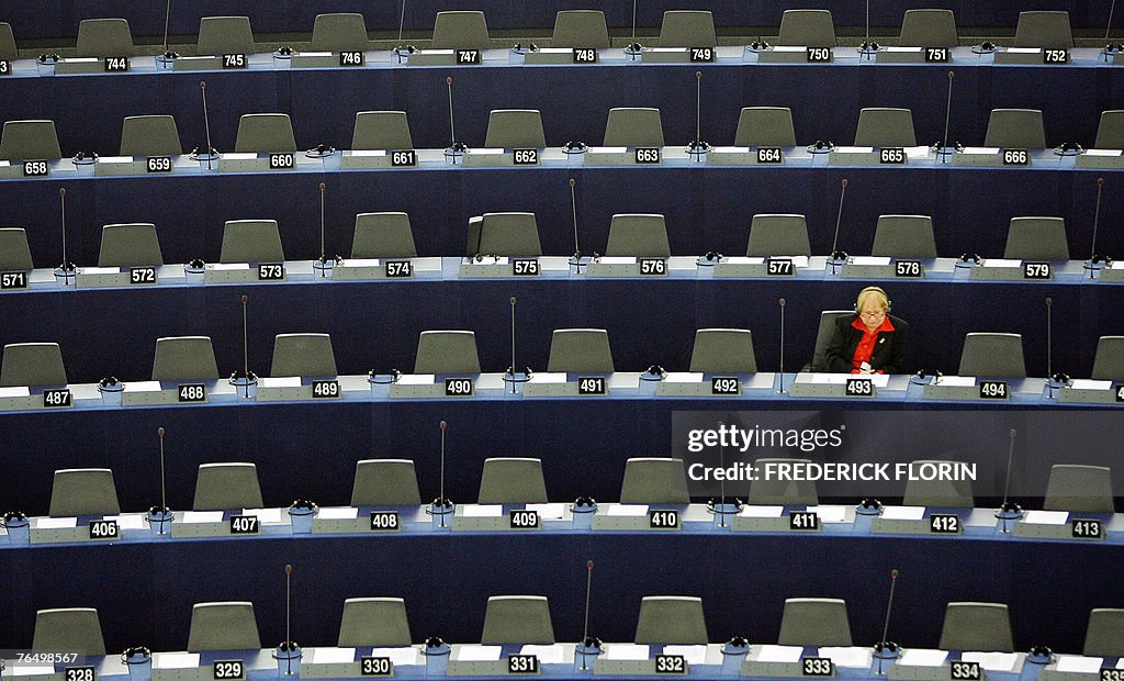 A Europeen deputy attends the plenary se