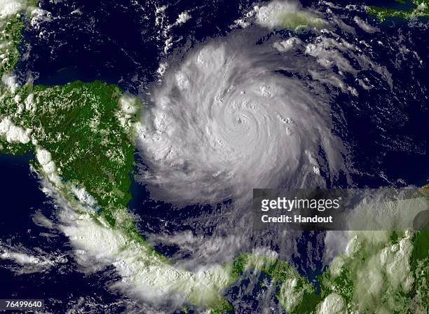 In this satellite image provided by the National Oceanic and Atmospheric Administration, Hurricane Felix, a Category 5 storm, bears down on Central...