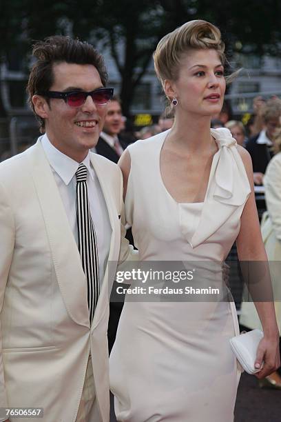 Director Joe Wright and Rosmund Pike arrive at the Atonement UK Premiere on September 3, 2007 in London, England.