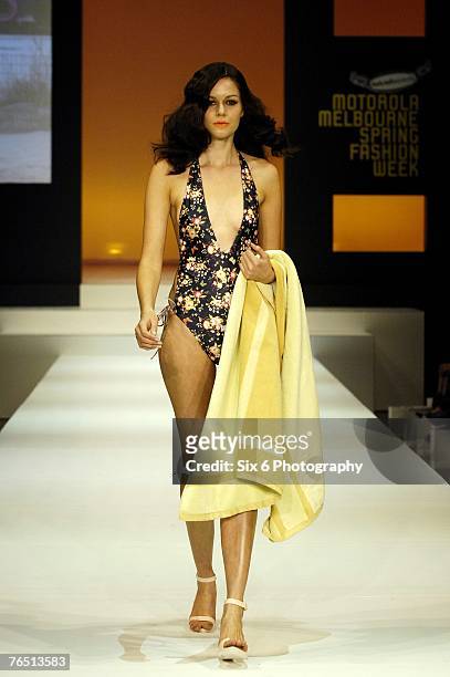 Model showcases designs on the catwalk at the Hot in the City evening parade, featuring designs by Bettina Liano, Clemente Talarico, Flamingo Sands,...