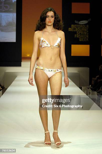 Model showcases designs on the catwalk at the Hot in the City evening parade, featuring designs by Bettina Liano, Clemente Talarico, Flamingo Sands,...