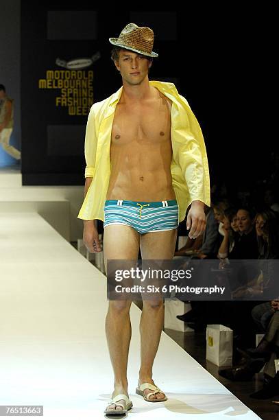 Model showcases designs on the catwalk at the Hot in the City evening parade, featuring designs by Bettina Liano, Clemente Talarico, Flamingo Sands,...