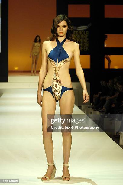 Model showcases designs on the catwalk at the Hot in the City evening parade, featuring designs by Bettina Liano, Clemente Talarico, Flamingo Sands,...