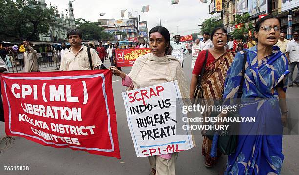 Supporters of the Communist Party of India shout slogans as they stage a protest rally in Kolkata, 05 September 2007. A massive naval drill kicked...