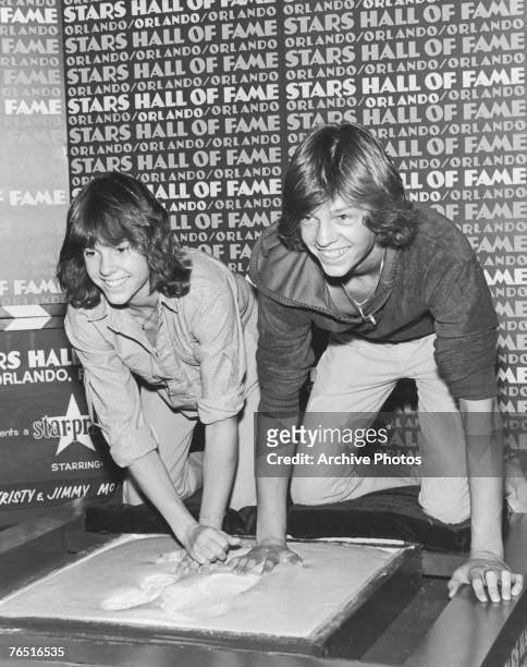 American television stars Kristy McNichol and her brother Jimmy set their footprints and handprints in wet cement at the Stars Hall of Fame in...