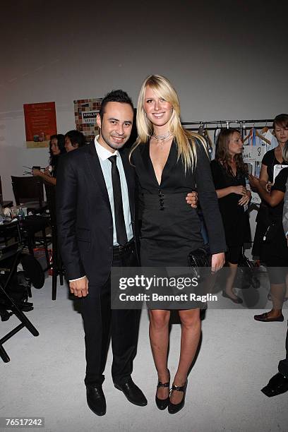 Designer Carlos Campos and America's Next Top Model winner CariDee English pose for a picture backstage at the Carlos Campos Fashion Show, Starlight...