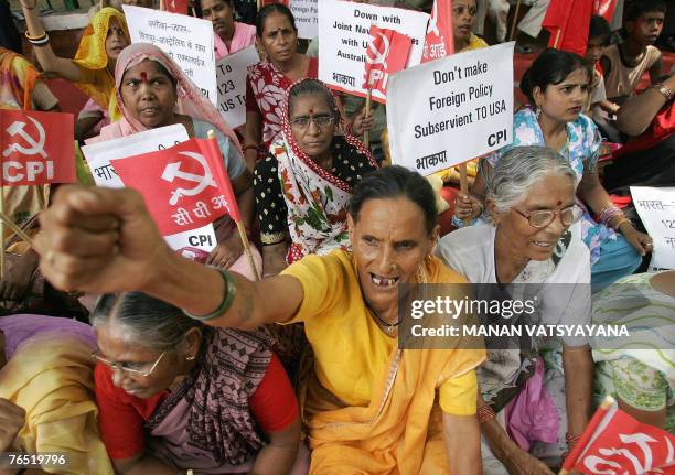 Indian Left activists shout slogans and hold placards as they take part in a protest in New Delhi, 05 September 2007, against a massive joint naval...