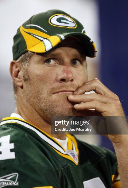 Brett Favre of the Green Bay Packers watches the action from the bench against the Tennessee Titans during a preseason game on August 30, 2007 at LP...