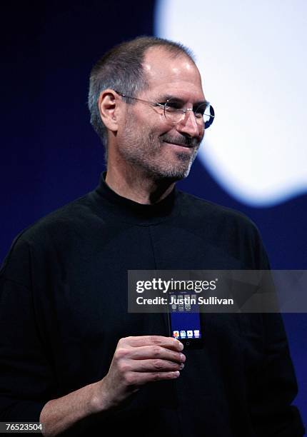 Apple CEO Steve Jobs holds up the new iPod Touch during an Apple Special event September 5, 2007 in San Francisco, California. Jobs announced a new...