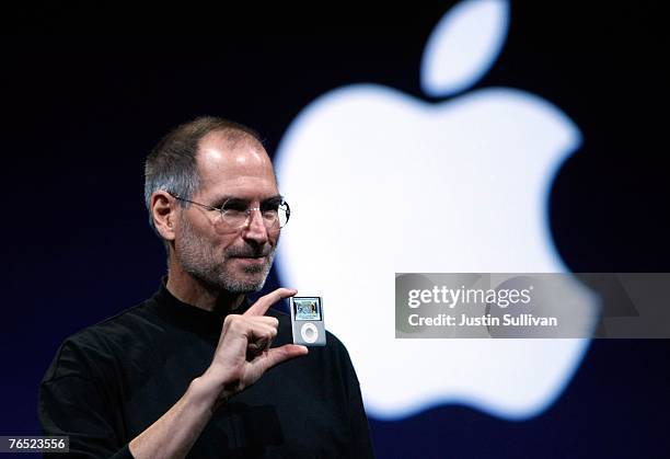 Apple CEO Steve Jobs holds up a new version of the iPod Nano during an Apple Special event September 5, 2007 in San Francisco, California. Jobs...