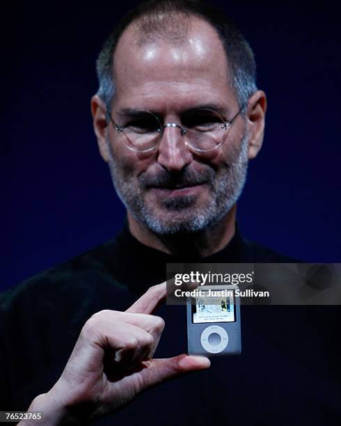 Apple CEO Steve Jobs holds up a new version of the iPod Nano during an Apple Special event September 5, 2007 in San Francisco, California. Jobs...