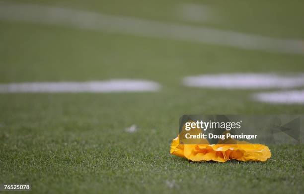 View of the yellow flag on the field taken during the Preseason game between the Denver Broncos and the Arizona Cardinals at Invesco Field on August...