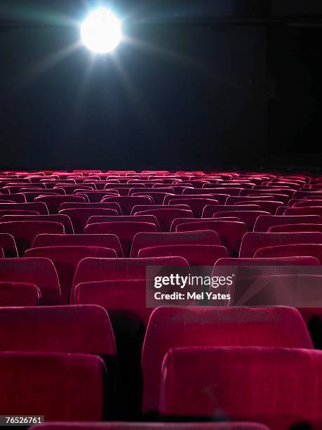 rows of empty red cinema seats - london theatre stock pictures, royalty-free photos & images