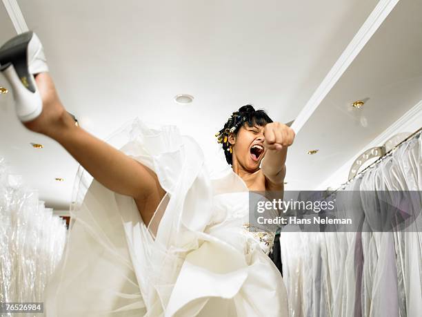 young bride kicking in air - asian ceiling fotografías e imágenes de stock