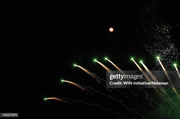 fireworks at night - fire works stock pictures, royalty-free photos & images