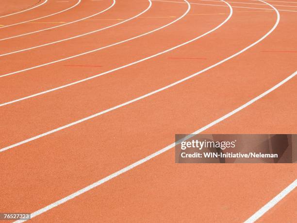 track and field course - lane stock pictures, royalty-free photos & images