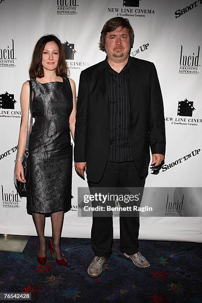 Producer Susan Montford and Producer Don Murphy pose for a picture on the red carpet during the New York premiere of "Shoot 'EM UP" at the Regal...