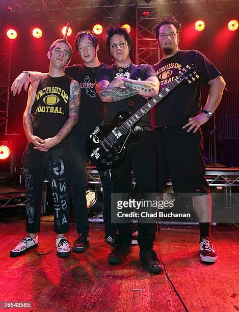 Band members KennyB, Btown, Tryg Littlefield and Big Ken of "Fall from Grace" attend the Bodog Battle of The Bands live series finale at the House of...