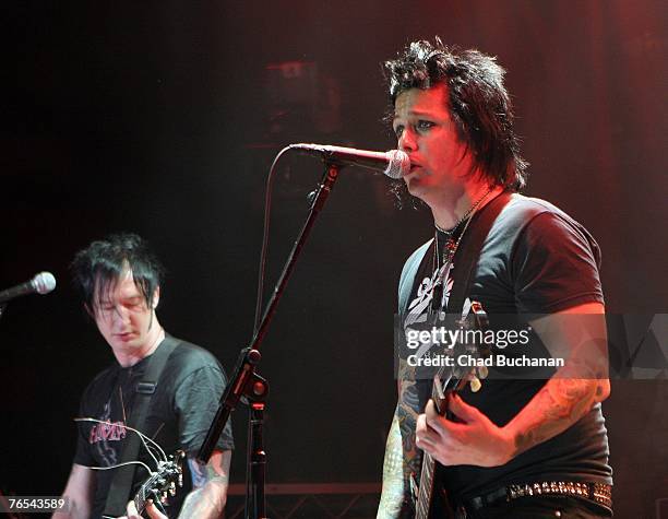 Band members Btown and Tryg Littlefield of "Fall from Grace" perform at the Bodog Battle of The Bands live series finale at the House of Blues on...