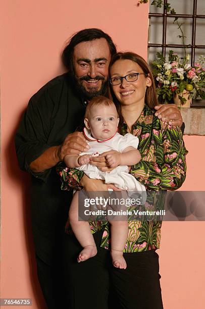 The picture taken in October 30, 2003 in Modena, Italy, shows opera singer Luciano Pavarotti with his wife Nicoletta Mantovani and their daughter...